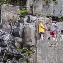 Danny and Hastings balance atop one of the hot springs posts