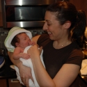 Mommy gets her ready for the cleaning!