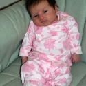She relaxes in her gliding chair