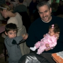 Cousin Max shows Uncle Daniel and Cousin Sara his new wrist watch