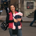 Mommy arrives outside the building, waiting for Daddy to pick her up.