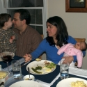 Lena relaxes at dinner, while big brother Michael is absorbed with his Daddy (Joe)