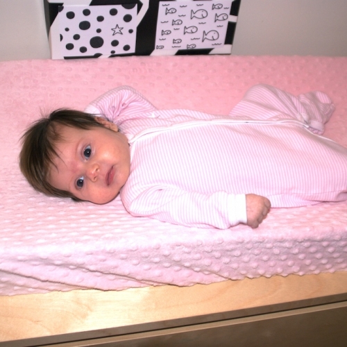 Sara relaxes in her changing station