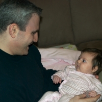 Daddy and Sara playing together
