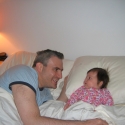 Sara and Daddy laze in bed...