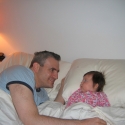 Sara and Daddy laze in bed...