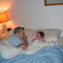 Sara and Daddy laze in bed...