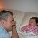 Sara and Daddy laze in bed...