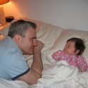 Sara and Daddy laze in bed...