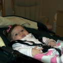 Sara in her newly reconfigured chair stroller