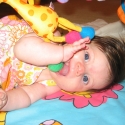 Playing on her playmat