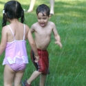 The kids in the sprinkler