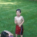 The kids in the sprinkler
