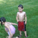 The kids in the sprinkler
