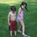 The kids in the sprinkler