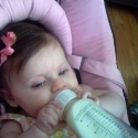 Holding her own bottle