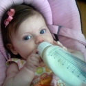 Holding her own bottle