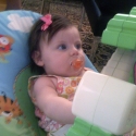 In her soon to arrive friend's bouncy seat!