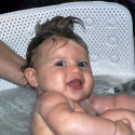 In the bath, with her stylish mohawk!