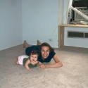 Before leaving, Sara and Mommy play on the new carpet in our bedroom!