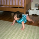 Playing on her rug