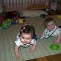 Sara and Grant play on the carpet