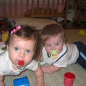 Sara and Grant play on the carpet