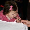 After enjoying her apples and banana, Sara moved on to eating a spoon!
