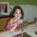 Julia lights the menorah
