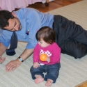 Sara and Great Uncle Henry play on Sara's carpet