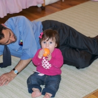 Great Uncle Henry brought Sara an orange ball....