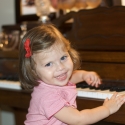 At Aunt Gorgeous's house, Sara tickles the ivories