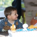 Birthday boy blows out the candles