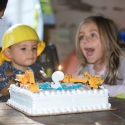 Birthday boy blows out the candles